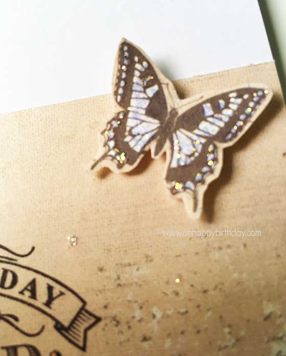 Using glitters on rubber stamped butterfly image.